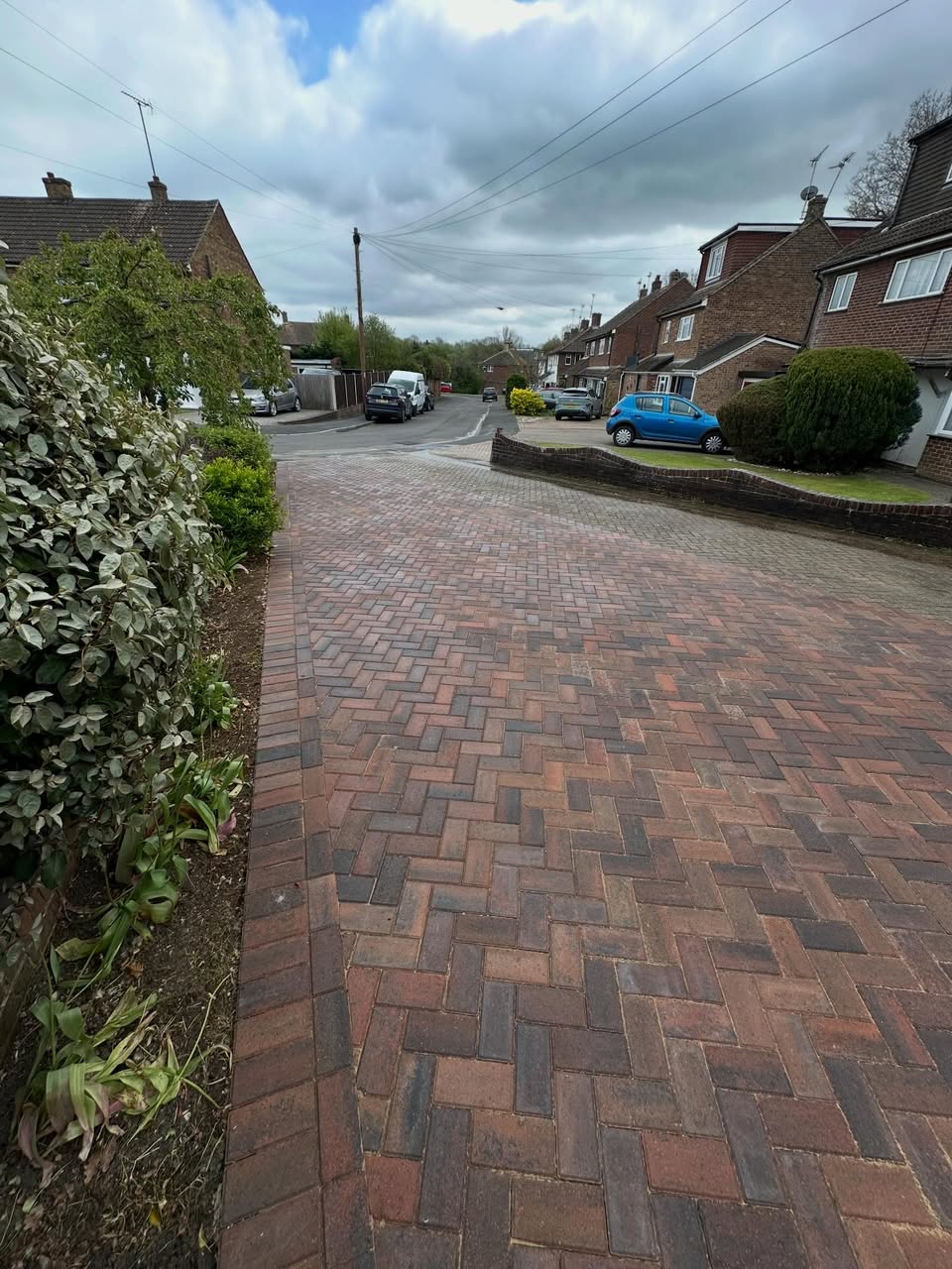 Finished driveway edge with new planting alongside